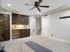 Finished basement featuring built-in cabinets, carpet flooring, and a drop ceiling at 1457 W Bahia Ct, Gilbert, AZ 85233