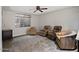Basement Gathering room with plush carpeting, natural light and comfortable seating at 1457 W Bahia Ct, Gilbert, AZ 85233