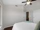 Neutral bedroom features vaulted ceiling, ceiling fan, and large closet at 1457 W Bahia Ct, Gilbert, AZ 85233