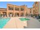 Enjoy community living with a sparkling pool, hot tub, and ample seating for relaxation and socializing at 14575 W Mountain View Blvd # 11315, Surprise, AZ 85374