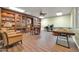 Spacious library with wall-to-wall bookshelves and a study area for a cozy atmosphere at 14575 W Mountain View Blvd # 11315, Surprise, AZ 85374