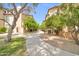 Scenic walking path winding through well-maintained green spaces, providing outdoor enjoyment at 14575 W Mountain View Blvd # 11315, Surprise, AZ 85374