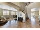 Inviting home foyer with a staircase and views of the dining and living rooms at 15138 W Campbell Ave, Goodyear, AZ 85395