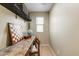 Compact home office features a built-in desk, a window, and ample natural light at 15138 W Campbell Ave, Goodyear, AZ 85395