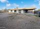 Spacious backyard with a covered patio area, offering ample space for outdoor activities and relaxation at 17405 N 19Th Dr, Phoenix, AZ 85023