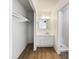Bathroom featuring modern vanity, sink, storage, and walk-in shower at 17405 N 19Th Dr, Phoenix, AZ 85023