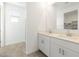 Bathroom with dual sinks and large vanity at 17433 W Eva St, Waddell, AZ 85355