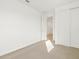 Bedroom with carpet, open door, and closet at 17433 W Eva St, Waddell, AZ 85355