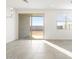 Sliding glass doors leading to a patio at 17433 W Eva St, Waddell, AZ 85355