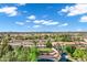 An aerial view captures a community featuring a water feature, landscaping and desert vegetation at 175 N Brookside St, Chandler, AZ 85225