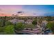 Stunning aerial view of lakeside homes with lush landscaping and amazing sunset sky at 175 N Brookside St, Chandler, AZ 85225