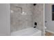 Beautiful bathroom with new tile in shower and built in shelf at 175 N Brookside St, Chandler, AZ 85225