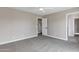 Bright bedroom with carpet and ensuite bathroom at 175 N Brookside St, Chandler, AZ 85225