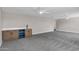 Expansive bonus room with carpet flooring, recessed lights, ceiling fans, and a modern wet bar at 175 N Brookside St, Chandler, AZ 85225