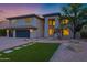 Contemporary two-story home featuring an attached garage and desert landscaping at 175 N Brookside St, Chandler, AZ 85225