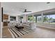 Bright and airy living room with a view of the lake, recessed lighting and modern decor at 175 N Brookside St, Chandler, AZ 85225
