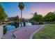 Dusk view of a pond with well-manicured landscaping and a tranquil setting at 175 N Brookside St, Chandler, AZ 85225