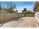 Expansive backyard featuring decorative gravel and a raised brick patio, offering versatility for outdoor activities at 17500 N 85Th Dr, Peoria, AZ 85382
