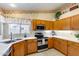 Functional kitchen with stainless steel appliances and ample counter space at 17500 N 85Th Dr, Peoria, AZ 85382