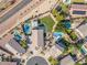 Aerial view of backyard featuring a sparkling blue swimming pool and green lawn at 20017 N 65Th Dr, Glendale, AZ 85308