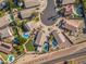 Real estate aerial showcasing an attractive home on a cul-de-sac with various pools at 20017 N 65Th Dr, Glendale, AZ 85308