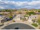 Aerial view of a desert landscaped home featuring a pool and mountain views at 20017 N 65Th Dr, Glendale, AZ 85308