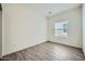 Bedoom featuring tile floors, neutral walls, and plentiful natural light at 2206 S Ellsworth Rd # 129B, Mesa, AZ 85201
