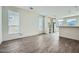 Bright and airy living room features tile floors, neutral walls, and plentiful natural light at 2206 S Ellsworth Rd # 129B, Mesa, AZ 85201