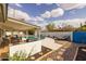 Backyard with a pool, covered patio, and lush landscaping at 2539 E Geneva Dr, Tempe, AZ 85282