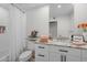 Bright bathroom features granite counters, white cabinets and a shower/tub combination at 2539 E Geneva Dr, Tempe, AZ 85282