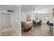 Open-concept dining room with stylish chandelier, wood floors, and modern finishes at 2539 E Geneva Dr, Tempe, AZ 85282