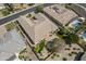 Aerial perspective showcases a backyard retreat featuring a pool, comfortable seating area, and verdant landscape at 2949 E Athena Ave, Gilbert, AZ 85297