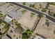 Aerial view highlighting the private backyard oasis with pool, lush landscaping, patio, and well-maintained yard at 2949 E Athena Ave, Gilbert, AZ 85297