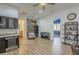 Large bonus room with bar area, beverage fridge, sitting area, and musical instruments at 2949 E Athena Ave, Gilbert, AZ 85297