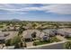 Front aerial shot highlighting a well-kept home with beautiful landscaping, nice curb appeal, and neighborhood charm at 2949 E Athena Ave, Gilbert, AZ 85297