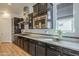 Modern kitchen features stainless steel appliances, granite counters, and a stylish tile backsplash at 2949 E Athena Ave, Gilbert, AZ 85297