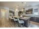 Spacious kitchen with a large island, stainless steel appliances, and ample seating for casual dining at 2949 E Athena Ave, Gilbert, AZ 85297