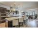 Spacious kitchen features a large island with pendant lighting and stainless steel appliances at 2949 E Athena Ave, Gilbert, AZ 85297