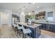 Bright kitchen with stainless steel appliances, granite countertops, and a large center island at 2949 E Athena Ave, Gilbert, AZ 85297