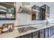 Modern kitchen with stainless steel appliances, granite countertops, and custom cabinetry at 2949 E Athena Ave, Gilbert, AZ 85297