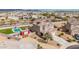 Aerial shot of the property showcasing the pool, shed, and well-manicured yard at 30878 W Picadilly Rd, Buckeye, AZ 85396