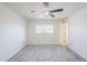 Bright bedroom with neutral tones, ceiling fan and window offering natural light at 3220 E Andorra Dr, Phoenix, AZ 85032