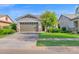 Charming single-Gathering home featuring a well-maintained lawn and a spacious two-car garage at 3504 E Pinto Dr, Gilbert, AZ 85296