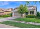 Single-Gathering home boasting a well-manicured lawn and a convenient two-car garage at 3504 E Pinto Dr, Gilbert, AZ 85296