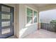 Inviting front porch featuring a modern door and stone accents, enhancing curb appeal at 3504 E Pinto Dr, Gilbert, AZ 85296