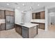 Well-appointed kitchen with stainless appliances, a center island, and ample cabinetry at 3504 E Pinto Dr, Gilbert, AZ 85296