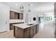 Stylish kitchen with an island, stainless steel appliances, and ample cabinet space at 3504 E Pinto Dr, Gilbert, AZ 85296