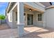 Covered patio has tile flooring with nice back yard with desert landscaping at 3504 E Pinto Dr, Gilbert, AZ 85296