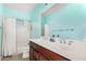 A bright bathroom features a double sink vanity and tiled shower-tub combination at 3683 E Nolan Dr, Chandler, AZ 85249