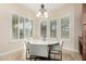 Cozy breakfast nook area with natural lighting from surrounding windows and comfortable seating at 3683 E Nolan Dr, Chandler, AZ 85249